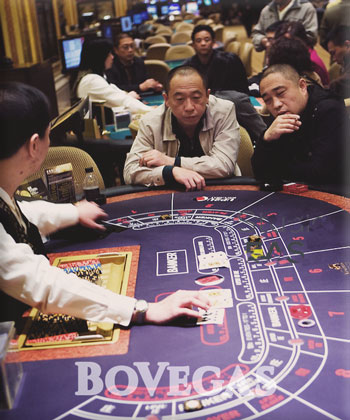 Baccarat Two Asians playing Baccarat 