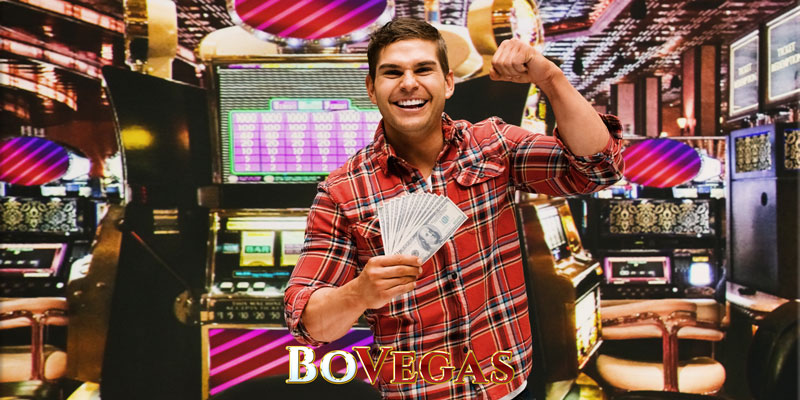 Gambling Guy standing with pool prize from slot machine