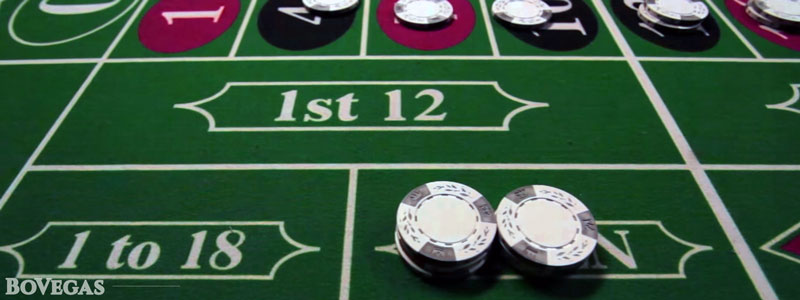 Gambling Table Games Roulette with bets on it 