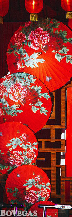 Chinese red umbrellas on the wall 