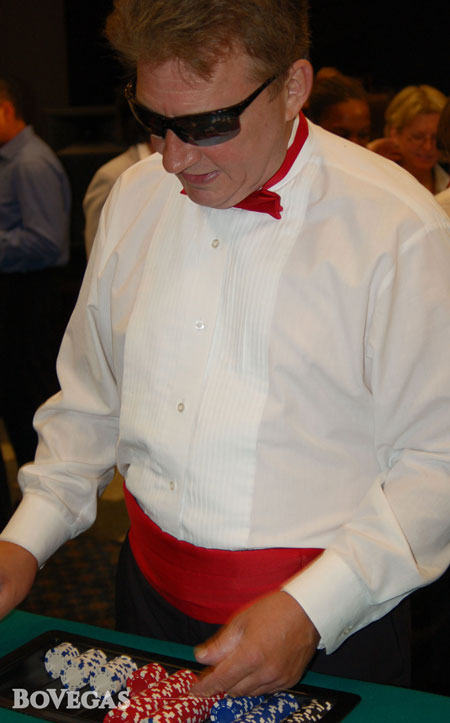 Dealer in Casino in white shirt