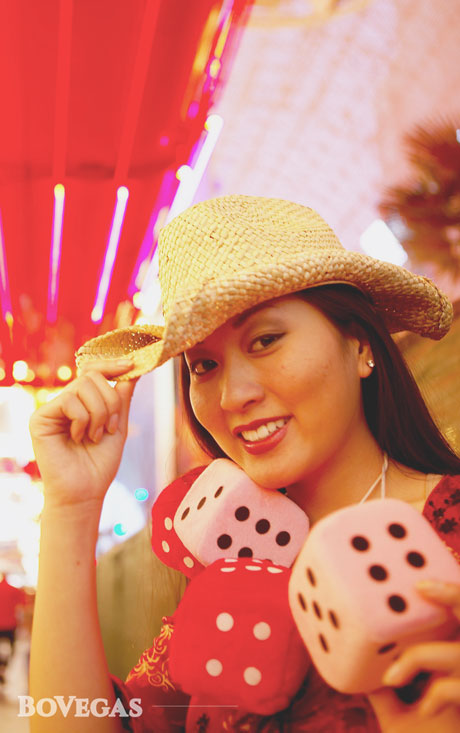 Gambling Girl with dices on Neck