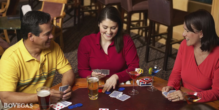 Man-and-Woman playing Torgather cards