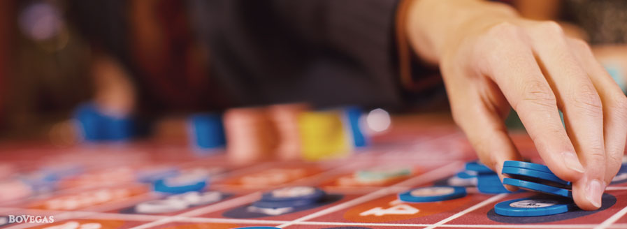 Guy making bet in casino